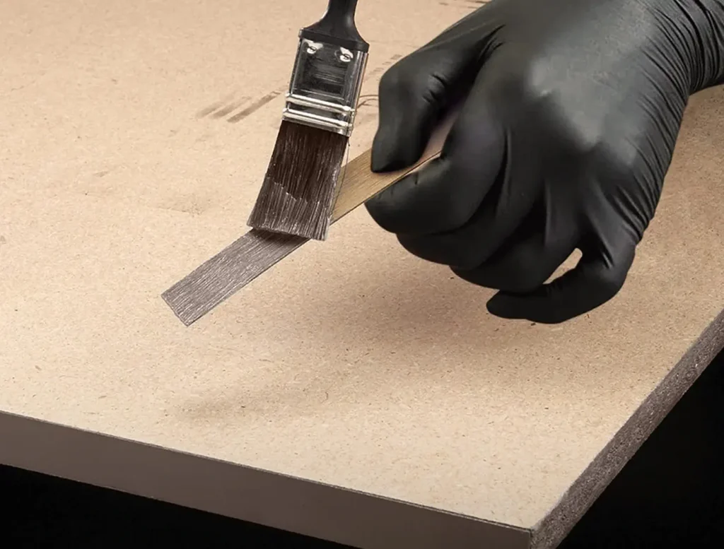 Applying Contact Adhesive with a Brush