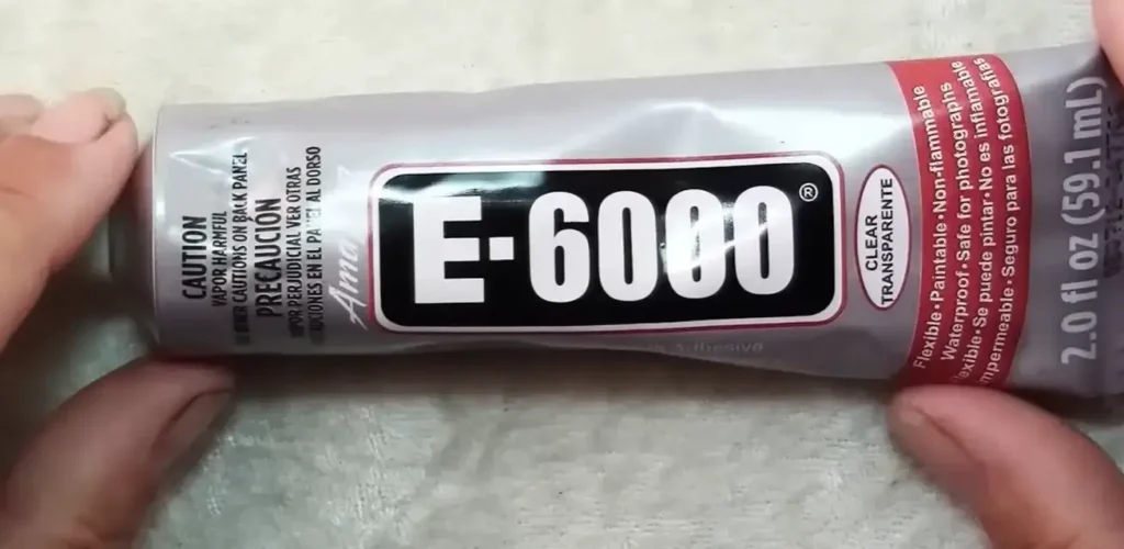 Holding E6000 Glue with Two Hands